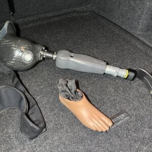 Above knee Ossur Rheo Prosthetic with Upper and Lower Attachments Right Leg